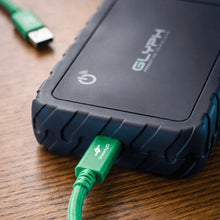 Load image into Gallery viewer, Green Connect+ USB-C cable connected to GLYPH Atom EX80