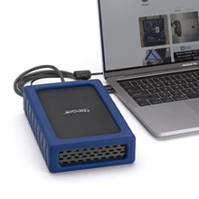 Load image into Gallery viewer, Oyen Digital Novus desktop hard drive connected to a MacBook Pro