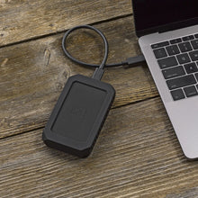 Load image into Gallery viewer, OYEN DIGITAL U34 Bolt SSD connected to a laptop