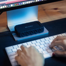 Load image into Gallery viewer, GLYPH Atom EX40 connected beneath a desktop monitor