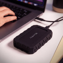 Load image into Gallery viewer, GLYPH Atom EX40 USB4 SSD connected beside a laptop