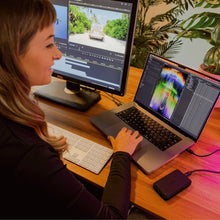 Load image into Gallery viewer, GLYPH Atom PRO V2 connected to a professional editing workstation
