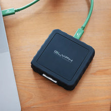 Load image into Gallery viewer, GLYPH Capture+ CFexpress card reader connected beside a laptop