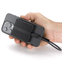 Load image into Gallery viewer, OYEN DIGITAL Helix MAG40 portable SSD attached to an iPhone held in one hand